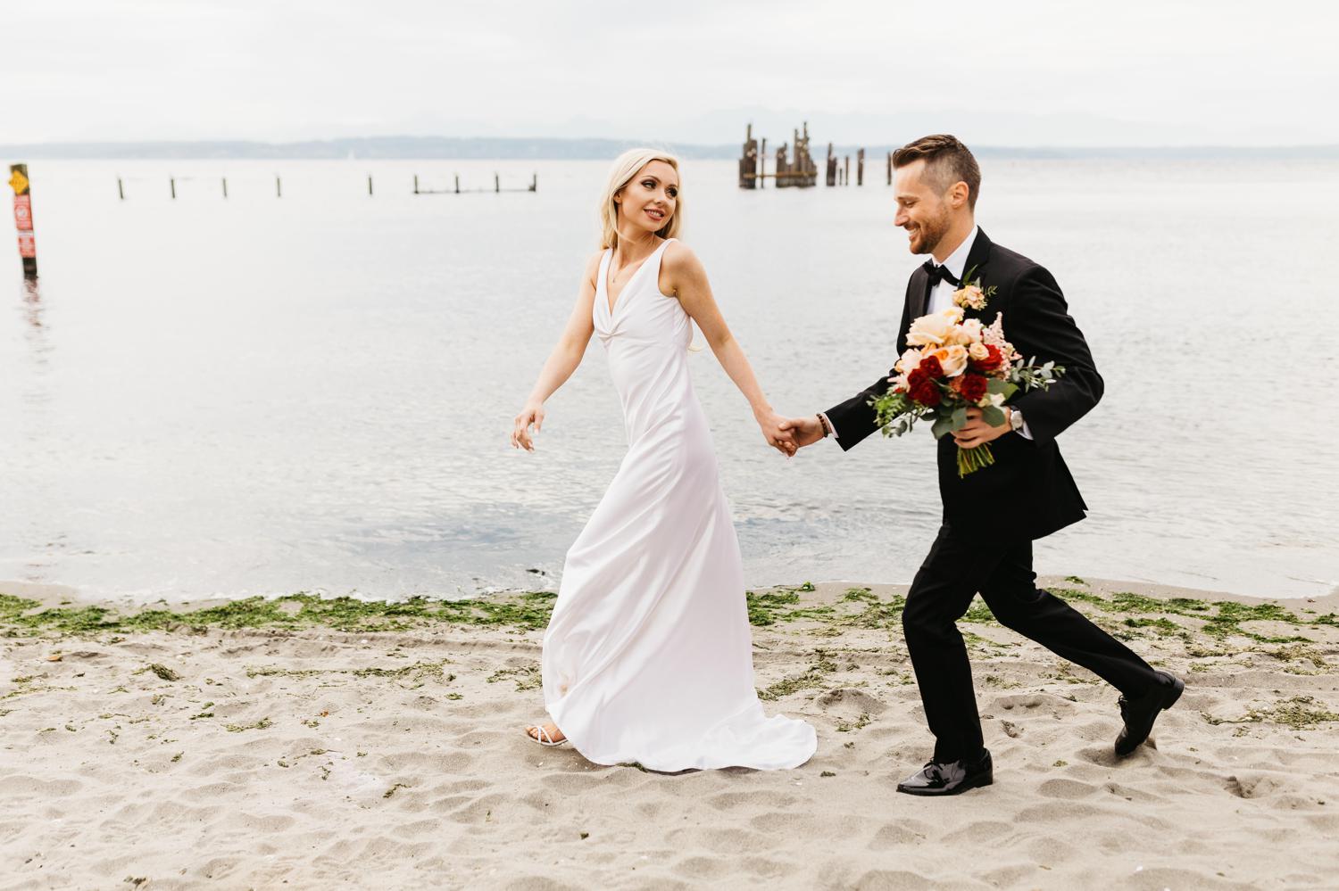 wedding portraits on beach at ballard bay club