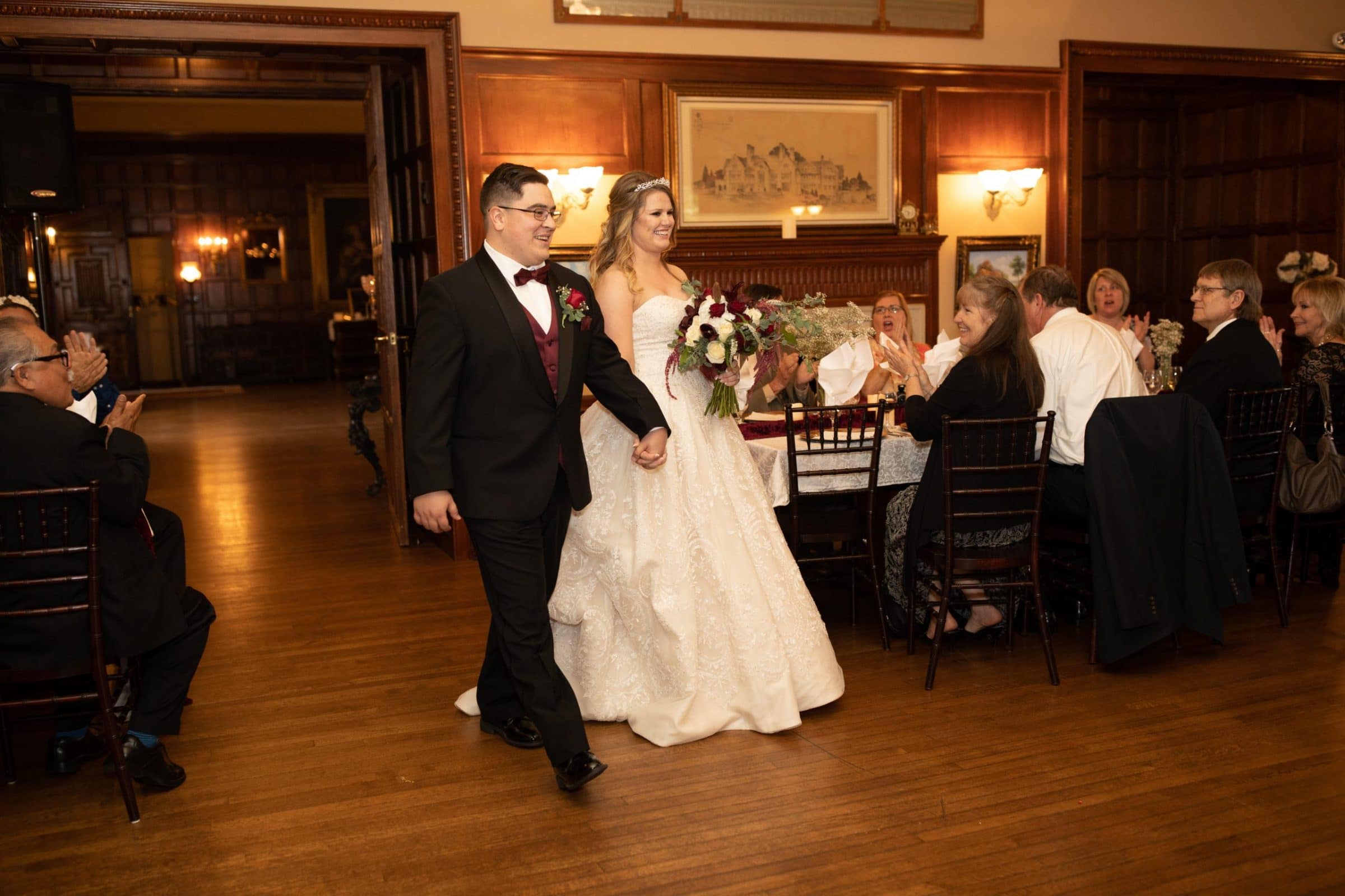 bride and groom grand entrance at thornewood castle