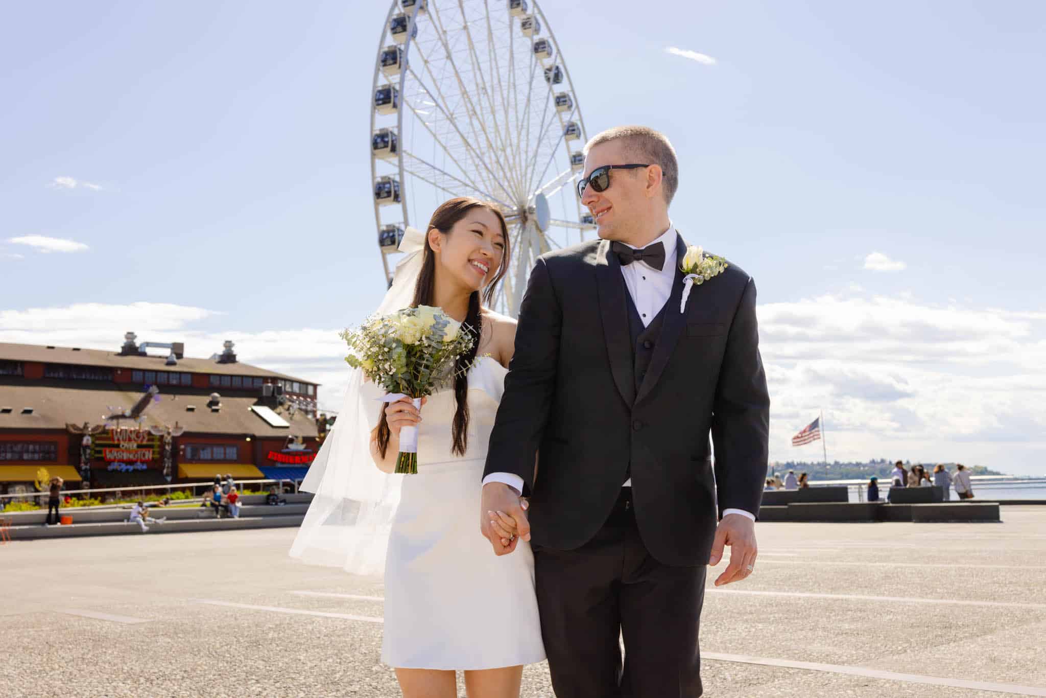 seattle waterfront wedding photos in front of the great wheel